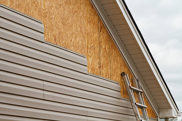 Professional Siding technician working in Amity, PA